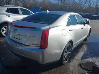 2014 Cadillac ATS Luxury AWD with VIN 1G6AH5SX9E0115789, listed as a IAAI auction lot 41029195 with 125,307 mi miles and . Bid and sale history available at carsss.com. Image 4.