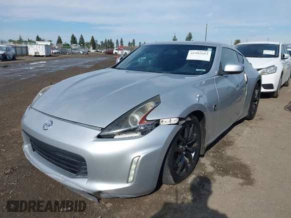2018 Nissan 370Z Sport with VIN JN1AZ4EH7JM572602, listed as a IAAI auction lot 41902662 with 76,262 mi miles and . Bid and sale history available at DreamBid. Image 20.