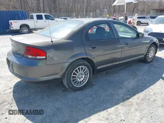 2005 Chrysler Sebring z VIN 1C3EL46X35N658547, wystawiony jako IAAI lot #41747506 z przebiegiem 118 414 mil mil oraz . Historia ofert i sprzedaży dostępna na DreamBid. Obrazek 4.