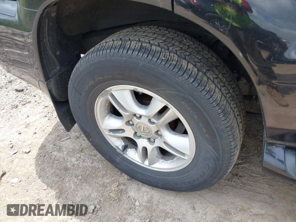 2003 Lexus GX 470 with VIN JTJBT20X230011298, listed as a IAAI auction lot 42251252 with 177,140 mi miles and . Bid and sale history available at DreamBid. Image 6.