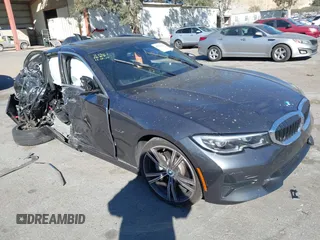 2022 BMW 3 Series 330e with VIN 3MW5P7J05N8C77293, listed as a IAAI auction lot 41322532 with 1 mi miles. Bid and sale history available at carsss.com. Image 1.