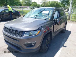 2018 Jeep Compass Latitude with VIN 3C4NJDBB0JT454598, listed as a IAAI auction lot 42318972 with 42,848 mi miles and . Bid and sale history available at DreamBid. Image 2.