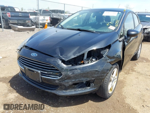 2019 Ford Fiesta SE with VIN 3FADP4BJ2KM165435, listed as a IAAI auction lot 42077508 with 118,784 mi miles. Bid and sale history available at carsss.com. Image 6.