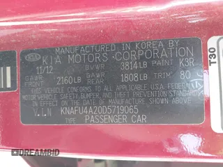 2013 Kia Forte EX with VIN KNAFU4A20D5719065, listed as a IAAI auction lot 42130847 with 170,878 mi miles. Bid and sale history available at carsss.com. Image 9.