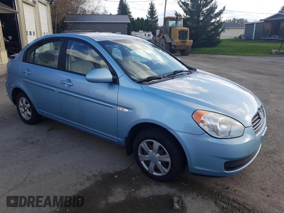 2007 Hyundai Accent GL z VIN KMHCN45C97U146808, wystawiony jako Copart lot #70781004 z przebiegiem Nie podano mil oraz Szkoda całkowita • Salvage title. Historia ofert i sprzedaży dostępna na DreamBid. Obrazek 4.