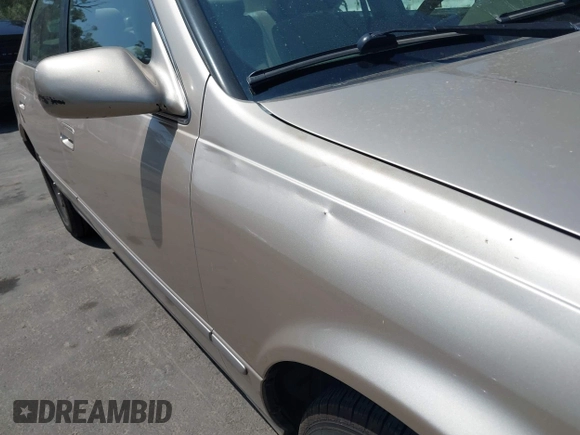 1999 Toyota Camry LE z VIN JT2BG22K1X0369726, wystawiony jako IAAI lot #42354218 z przebiegiem 213 828 mil mil oraz . Historia ofert i sprzedaży dostępna na DreamBid. Obrazek 12.