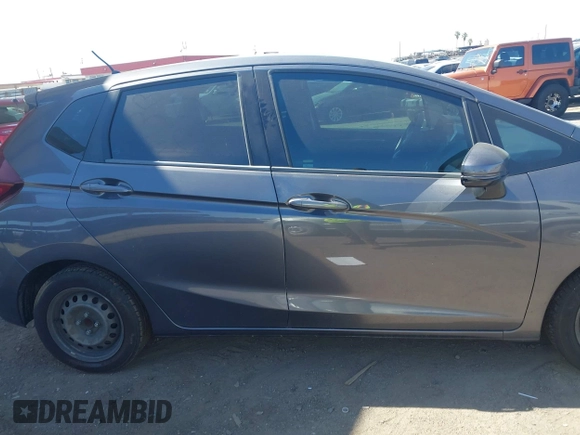 2018 Honda Fit LX with VIN 3HGGK5H51JM731851, listed as a IAAI auction lot 42570144 with 69,236 mi miles and . Bid and sale history available at DreamBid. Image 13.