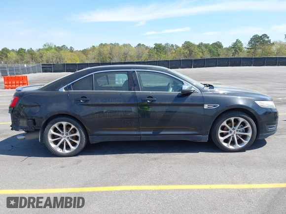 2015 Ford Taurus Limited with VIN 1FAHP2J81FG134973, listed as a IAAI auction lot 41845384 with 139,203 mi miles. Bid and sale history available at carsss.com. Image 13.