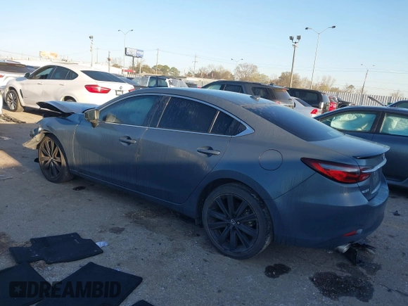 2021 Mazda 6 Carbon Edition with VIN JM1GL1WY9M1619981, listed as a IAAI auction lot 41751194 with 32,083 mi miles and . Bid and sale history available at DreamBid. Image 3.