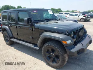 2021 Jeep Wrangler Unlimited Willys z VIN 1C4HJXDG2MW789125, wystawiony jako IAAI lot #42396070 z przebiegiem 68 045 mil mil oraz . Historia ofert i sprzedaży dostępna na DreamBid. Obrazek 1.
