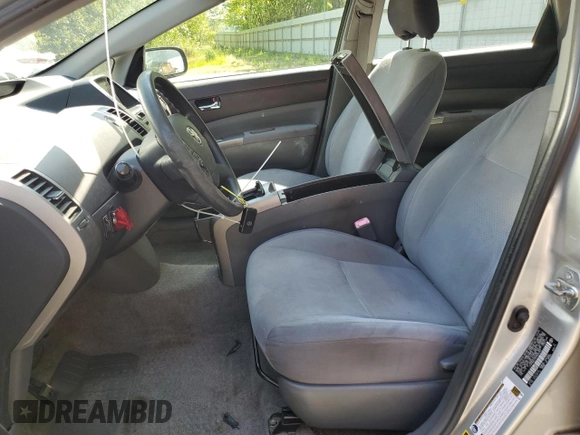 2005 Toyota Prius z VIN JTDKB20U053065387, wystawiony jako Copart lot #58809325 z przebiegiem 249 936 mil mil oraz Szkoda całkowita • Salvage title. Historia ofert i sprzedaży dostępna na DreamBid. Obrazek 7.