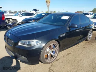 2014 BMW M5 with VIN WBSFV9C56ED097611, listed as a IAAI auction lot 41845196 with 72,215 mi miles. Bid and sale history available at carsss.com. Image 17.