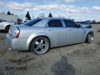 2005 Chrysler 300 C with VIN 2C3AA63H15H674199, listed as a Copart auction lot 47628215 with 154,052 mi miles and Salvage Title. Bid and sale history available at DreamBid. Image 3.