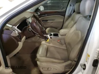 2014 Cadillac SRX Premium Collection z VIN 3GYFNGE36ES581361, wystawiony jako Copart lot #88540815 z przebiegiem 137 047 mil mil oraz Nie do naprawy. Historia ofert i sprzedaży dostępna na DreamBid. Obrazek 7.