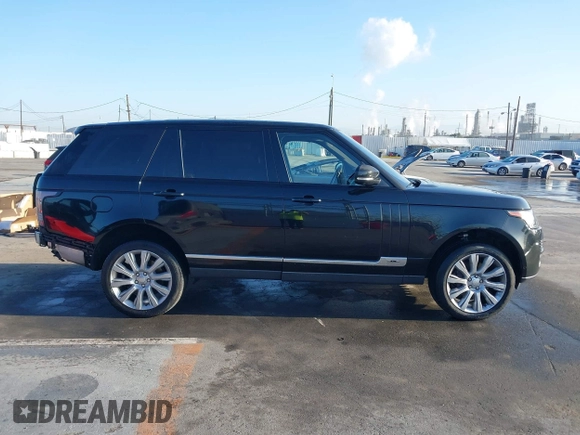 2014 Land Rover Range Rover Supercharged with VIN SALGS3TFXEA182763, listed as a IAAI auction lot 41945640 with 121,845 mi miles and . Bid and sale history available at DreamBid. Image 14.