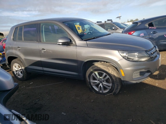 2012 Volkswagen Tiguan S with VIN WVGAV7AX7CW002660, listed as a Copart auction lot 86016034 with 185,938 mi miles and Salvage title. Bid and sale history available at DreamBid. Image 4.