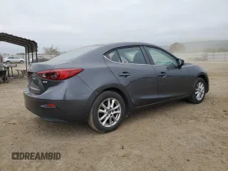 2016 Mazda 3 i Sport with VIN JM1BM1U74G1285879, listed as a Copart auction lot 54601455 with 67,136 mi miles and Salvage Title. Bid and sale history available at DreamBid. Image 3.