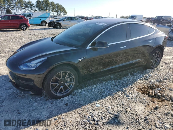 2019 Tesla Model 3 Mid Range with VIN 5YJ3E1EA3KF324201, listed as a Copart auction lot 43221185 with 117,606 mi miles and Salvage Title. Bid and sale history available at carsss.com. Image 1.