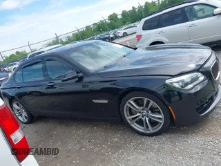 2013 BMW 7 Series 750Li z VIN WBAYE8C59DD133605, wystawiony jako IAAI lot #42179893 z przebiegiem 73 065 mil mil oraz . Historia ofert i sprzedaży dostępna na DreamBid. Obrazek 13.