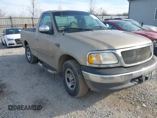 1999 Ford F-150 Work Series with VIN 1FTRF17W9XNB77925, listed as a IAAI auction lot 41511738 with 136,735 mi miles. Bid and sale history available at carsss.com. Image 1.