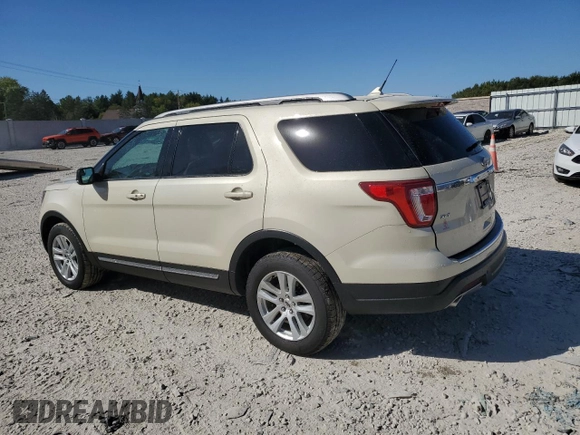 2018 Ford Explorer XLT with VIN 1FM5K8D86JGA12639, listed as a Copart auction lot 73129064 with 124,964 mi miles and Salvage Title. Bid and sale history available at DreamBid. Image 2.