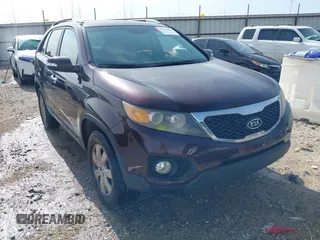 2011 Kia Sorento LX with VIN 5XYKTDA17BG154197, listed as a IAAI auction lot 41923864 with 143,010 mi miles and . Bid and sale history available at carsss.com. Image 1.