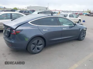 2020 Tesla Model 3 Long Range with VIN 5YJ3E1EB1LF639055, listed as a IAAI auction lot 42048009 with 43,493 mi miles. Bid and sale history available at carsss.com. Image 4.