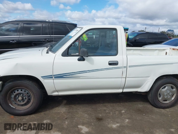 1992 Toyota Pickup DLX z VIN 4TARN81PXNZ004395, wystawiony jako IAAI lot #41729264 z przebiegiem 137 289 mil mil oraz . Historia ofert i sprzedaży dostępna na DreamBid. Obrazek 14.