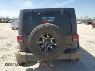 2017 Jeep Wrangler Unlimited 75th Anniversary with VIN 1C4HJWEGXHL546436, listed as a Copart auction lot 48229875 with 107,222 mi miles and Salvage title. Bid and sale history available at DreamBid. Image 6.
