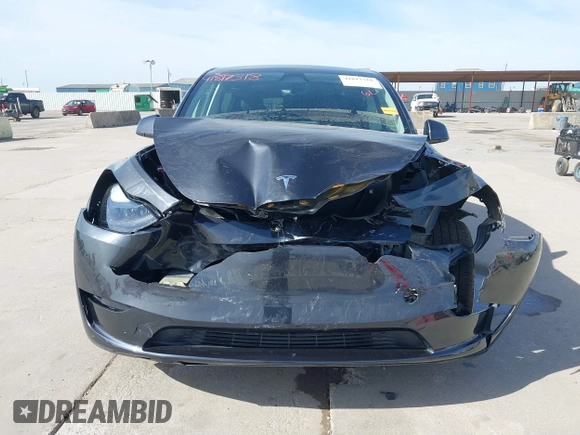 2024 Tesla Model Y with VIN 7SAYGDED9RF044789, listed as a IAAI auction lot 41817318 with Not Provided miles and . Bid and sale history available at DreamBid. Image 6.