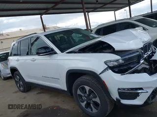 2023 Jeep Grand Cherokee with VIN 1C4RJYB60PC650900, listed as a IAAI auction lot 41773825 with 19,243 mi miles and . Bid and sale history available at DreamBid. Image 14.