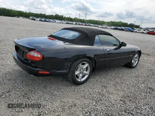 1999 Jaguar XK z VIN SAJGX2044XC031383, wystawiony jako Copart lot #54726925 z przebiegiem 107 696 mil mil oraz Szkody całkowita. Historia ofert i sprzedaży dostępna na DreamBid. Obrazek 3.