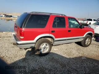 1995 Chevrolet Blazer z VIN 1GNDT13W4S2243226, wystawiony jako Copart lot #81429904 z przebiegiem 1 757 497 mil mil oraz Szkoda całkowita • Salvage title. Historia ofert i sprzedaży dostępna na DreamBid. Obrazek 3.