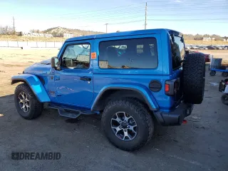 2021 Jeep Wrangler Rubicon with VIN 1C4HJXCG9MW794033, listed as a Copart auction lot 82809014 with 30,590 mi miles and Salvage title. Bid and sale history available at DreamBid. Image 2.
