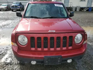 2014 Jeep Patriot Latitude with VIN 1C4NJRFB1ED651525, listed as a Copart auction lot 52526975 with 135,088 mi miles and Salvage Title. Bid and sale history available at carsss.com. Image 5.