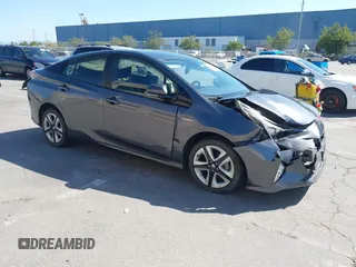 2016 Toyota Prius Four z VIN JTDKARFUXG3019426, wystawiony jako IAAI lot #42385785 z przebiegiem 94 838 mil mil oraz . Historia ofert i sprzedaży dostępna na DreamBid. Obrazek 1.