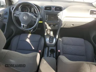 2014 Volkswagen Golf z VIN WVWDB7AJ2EW003496, wystawiony jako Copart lot #75106174 z przebiegiem 70 509 mil mil oraz Czysty tytuł • Clean title. Historia ofert i sprzedaży dostępna na DreamBid. Obrazek 8.