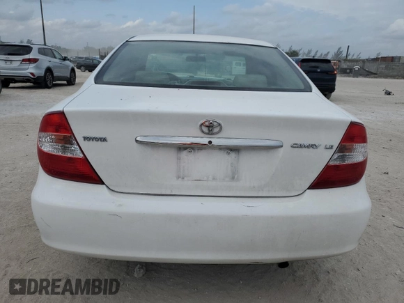 2004 Toyota Camry LE with VIN 4T1BE32K14U285392, listed as a Copart auction lot 48312415 with 121,629 mi miles and Salvage Title. Bid and sale history available at DreamBid. Image 6.