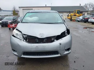 2012 Toyota Sienna LE with VIN 5TDJK3DCXCS040253, listed as a IAAI auction lot 41957623 with 164,780 mi miles. Bid and sale history available at carsss.com. Image 12.