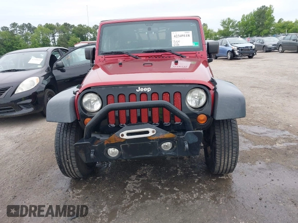 2012 Jeep Wrangler Sport with VIN 1C4AJWAG3CL197295, listed as a IAAI auction lot 42349118 with 117,381 mi miles and . Bid and sale history available at DreamBid. Image 12.