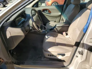 1999 Mercury Sable LS z VIN 1MEFM53S7XG602788, wystawiony jako Copart lot #76894294 z przebiegiem 186 315 mil mil oraz Szkody całkowita. Historia ofert i sprzedaży dostępna na DreamBid. Obrazek 7.
