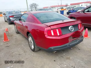 2012 Ford Mustang V6 Premium with VIN 1ZVBP8AM6C5262808, listed as a IAAI auction lot 41907866 with 121,630 mi miles. Bid and sale history available at carsss.com. Image 3.