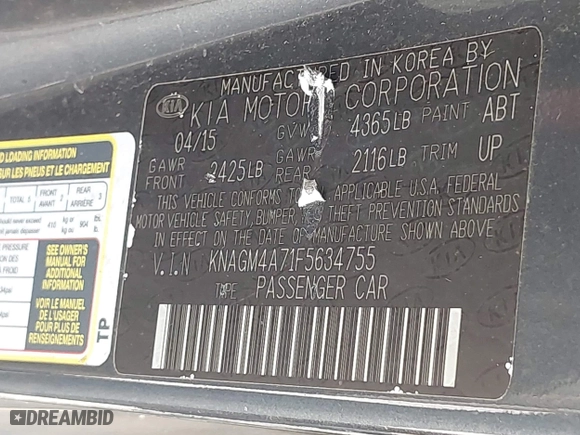 2015 Kia Optima LX with VIN KNAGM4A71F5634755, listed as a IAAI auction lot 42019729 with 101,064 mi miles. Bid and sale history available at carsss.com. Image 9.