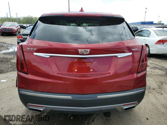 2023 Cadillac XT5 FWD Premium Luxury z VIN 1GYKNCRS5PZ173528, wystawiony jako Copart lot #55805605 z przebiegiem 7 789 mil mil oraz Szkoda całkowita • Salvage title. Historia ofert i sprzedaży dostępna na DreamBid. Obrazek 6.