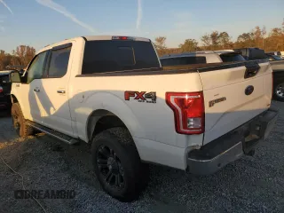 2015 Ford F-150 XLT with VIN 1FTEW1EFXFFB04685, listed as a Copart auction lot 77041514 with 161,088 mi miles and Salvage Title. Bid and sale history available at carsss.com. Image 2.