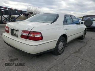 1998 Infiniti Q45 z VIN JNKBY31A8WM403038, wystawiony jako Copart lot #86904484 z przebiegiem 136 142 mil mil oraz Szkoda całkowita • Salvage title. Historia ofert i sprzedaży dostępna na DreamBid. Obrazek 3.