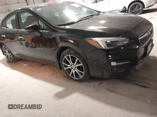 2018 Subaru Impreza Limited with VIN 4S3GKAT64J3619473, listed as a IAAI auction lot 41556573 with 84,312 mi miles. Bid and sale history available at carsss.com. Image 1.