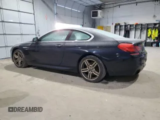 2012 BMW 6 Series 650i xDrive with VIN WBALX5C55CC893991, listed as a Copart auction lot 82749384 with 174,757 mi miles and Clean Title. Bid and sale history available at DreamBid. Image 2.