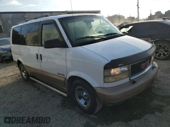 1999 GMC Safari z VIN 1GKDM19W2XB502093, wystawiony jako Copart lot #81719764 z przebiegiem 107 191 mil mil oraz Tytuł czysty. Historia ofert i sprzedaży dostępna na DreamBid. Obrazek 4.