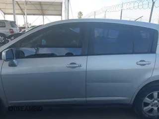 2009 Nissan Versa 1.8 SL with VIN 3N1BC13E29L406619, listed as a IAAI auction lot 41761728 with 115,510 mi miles. Bid and sale history available at carsss.com. Image 15.